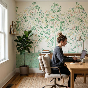 Marine wallpaper by Claire de Quénetain in green, a hand-painted floral design behind a desk in a home office