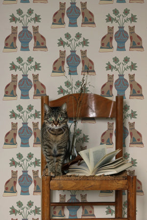 Pair of Cats wallpaper by Annika Reed in brown, pairs of cats and vases on a living room wall