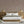 Blossom wallpaper by Dami and Em Design in beige, blossom branches in a bedroom
