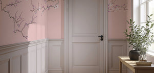 Blossom wallpaper by Dami and Em Design in pink, blossom branches in a hallway