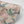 Blossom Vanilla wallpaper by Tatie Lou in beige, roll showing blossoms and birds