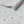 Caja Floral wallpaper by Seed Home Designs in pale blue, flat sample of line-drawn daisies