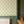 Daffodil wallpaper by Annika Reed in yellow and green, daffodils in a hallway