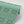 Esprit wallpaper by Tatie Lou in green, sample roll showing an ornate medallion print