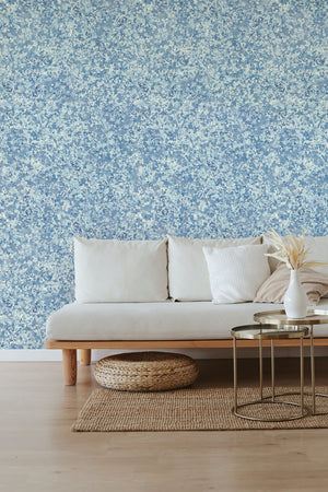 Ditzy wallpaper by House of Amitié in blue, fine hand-marbled pattern in a living room