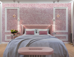 Ditzy wallpaper by House of Amitié in pink, fine hand-marbled pattern in a bedroom