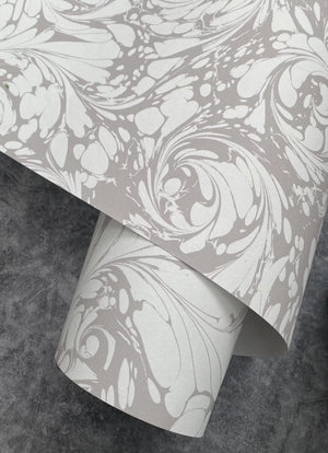 Flourish wallpaper by House of Amitié in silver, sample roll showing flowing scrolls