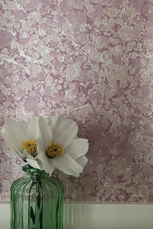 Ditzy wallpaper by House of Amitié in pink, fine hand-marbled pattern in a styled room setting