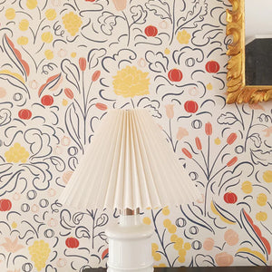 Beatrice wallpaper by Claire de Quénetain in red, a hand-painted floral design in a styled room setting