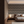 Manilva Garden wallpaper by Dami and Em Design in cream, an art deco garden design in a bedroom