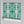 Marco Island wallpaper by Liberty James Studio in green, sample roll showing a scrolling damask design