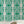 Marco Island wallpaper by Liberty James Studio in green, roll showing a scrolling damask design