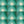 Motif wallpaper by Tatie Lou in green, flat sample of geometric pyramids