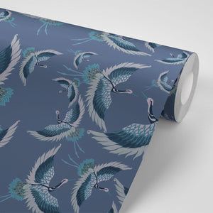 Pachamama wallpaper by Tatie Lou in navy, roll showing flying cranes