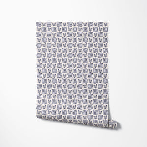 Picnic in the Flowers wallpaper by Studio Le Cocq in red, sample roll showing a small floral lattice (alternate view)