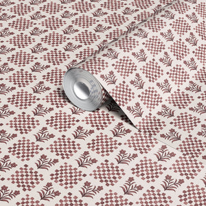 Picnic in the Flowers wallpaper by Studio Le Cocq in red, sample roll showing a small floral lattice