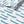 Swimming Sardines wallpaper by Seed Home Designs in grey, roll showing swimming sardines