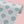 Aphrodite wallpaper by Annika Reed in blue, roll showing scallop shells