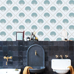 Aphrodite wallpaper by Annika Reed in blue, scallop shells in a bathroom