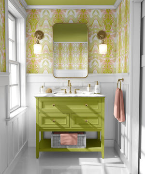 Bel Air Blossom wallpaper by Liberty James Studio in yellow-green, a mirrored blossom design in a bathroom setting