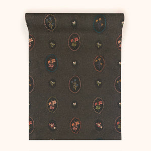 Bibury Sprig wallpaper by Parker and Jules in black, roll showing flower sprigs in ovals