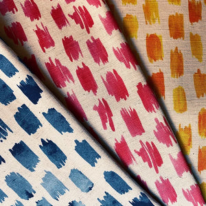 Brushstroke linen by Bethie Tricks in pink, draped, showing painted brushstrokes