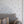 Caja Floral wallpaper by Seed Home Designs in grey, line-drawn daisies in a living room