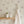 Caja Floral wallpaper by Seed Home Designs in white, line-drawn daisies in a bathroom