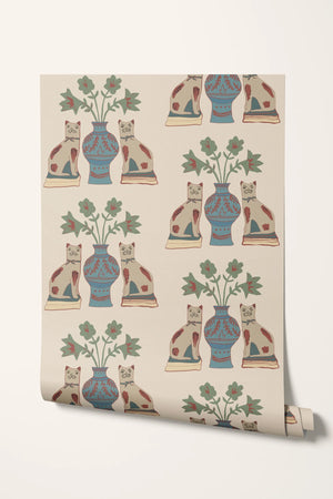 Pair of Cats wallpaper by Annika Reed in blue and cream, roll showing pairs of cats and vases