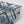 Indigo Itajime wallpaper by Tatie Lou in blue, roll showing itajime shibori folds