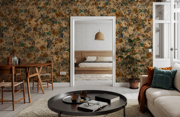 Bridie wallpaper by Curate Space in warm autumn orange, oversized painterly blooms in a living space with a view through a doorway