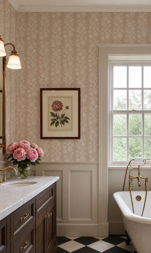 Dilys wallpaper by Curate Space in plaster beige, a floral stripe in a bathroom with a freestanding bath and framed botanical print