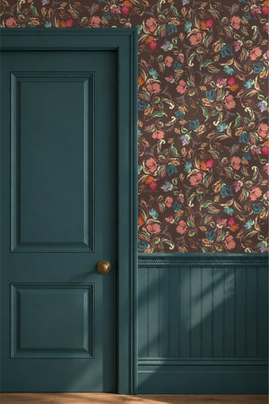 Freya wallpaper by Curate Space in brown, loose painterly flowers and leaves beside a deep green door