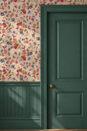 Freya wallpaper by Curate Space in soft pink, loose painterly flowers and leaves in a hallway above green panelling