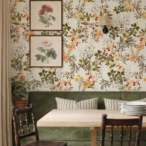 Iris wallpaper by Curate Space in off-white, botanical blooms and foliage in a dining nook with wooden chairs