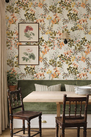 Iris wallpaper by Curate Space in off-white, botanical blooms and foliage in a dining nook with wooden chairs
