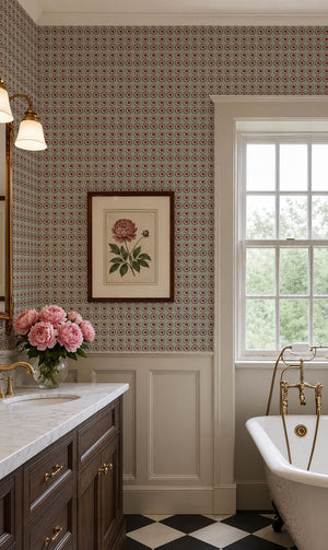 Mabel wallpaper by Curate Space in moss green, small rosette motifs in a bathroom with a freestanding bath and framed botanical print