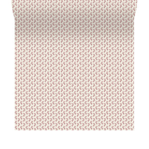 Maeva wallpaper by Curate Space in rouge red, rolled length showing a small trailing vine