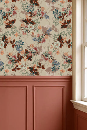 Orla wallpaper by Curate Space in light cream, layered florals and foliage over a trellis above terracotta panelling beside a window