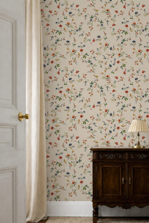 Paloma Curate Space wallpaper in off-white, trailing floral stems in a hallway doorway beside a dark cabinet
