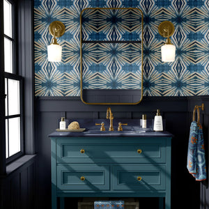 Indigo Itajime wallpaper by Tatie Lou in blue, itajime shibori folds in a bathroom