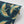 Pachamama wallpaper by Tatie Lou in navy, roll showing flying cranes