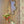 Jaipur wallpaper by Parker and Jules in pink, block-print flowers on a trellis in a hallway