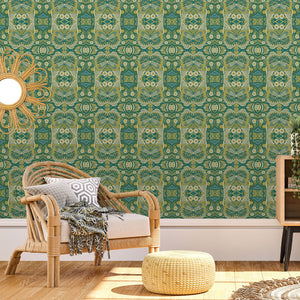 Esprit wallpaper by Tatie Lou in green, an ornate medallion print on a living room wall
