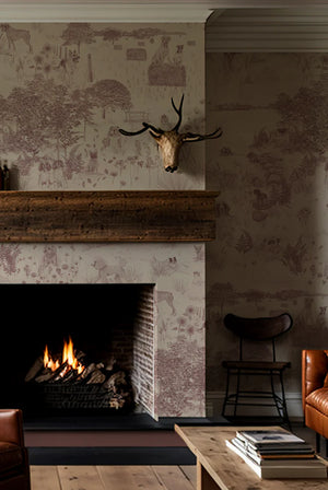 Dog Tales wallpaper by Victoria Sanders in burgundy, a toile of dogs in the countryside around a fireplace