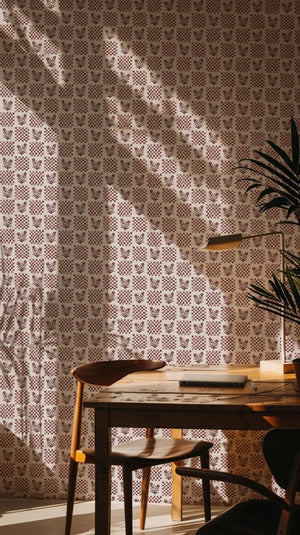 Picnic in the Flowers wallpaper by Studio Le Cocq in red, a small floral lattice in a dining area