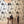 Vintage Dress wallpaper by Dupenny in black and white, 1950s dresses in a styled room setting