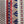 Wild Flower linen by Bethie Tricks in red and blue, the stripe on the right shown beside three other blue and red Bethie Tricks fabrics