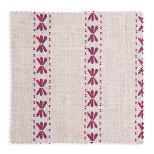 Wild Flower linen by Bethie Tricks in red and blue, swatch of a vertical stripe of small dragonfly-like motifs on natural linen